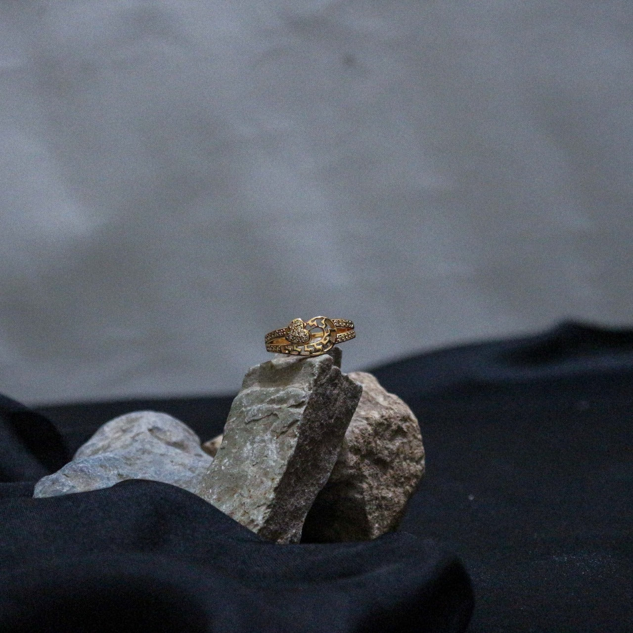 Golden ring with heart design