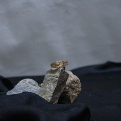 Golden ring with heart design