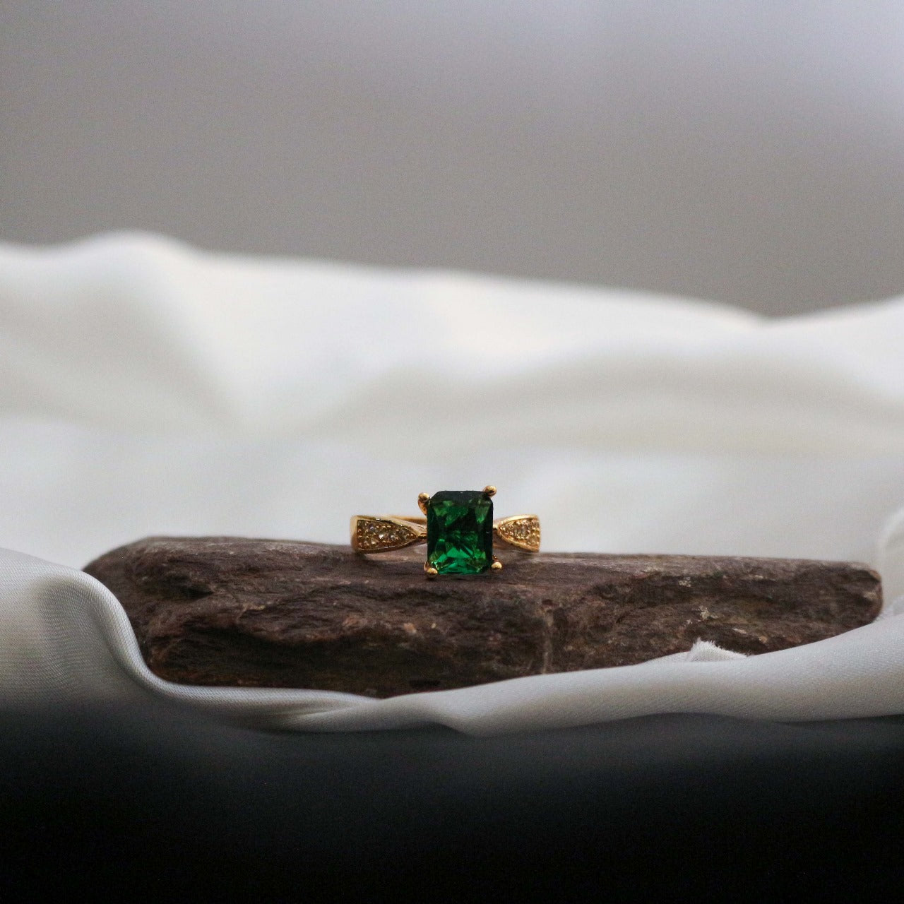  ring with a green gemstone