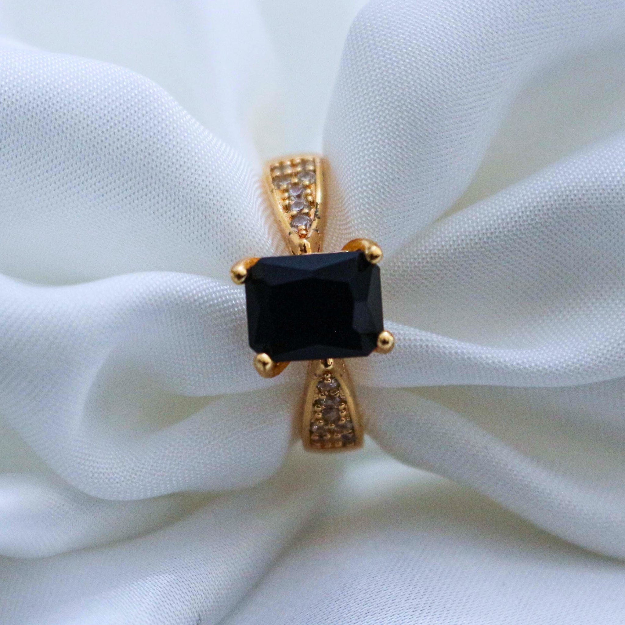  ring with a black gemstone