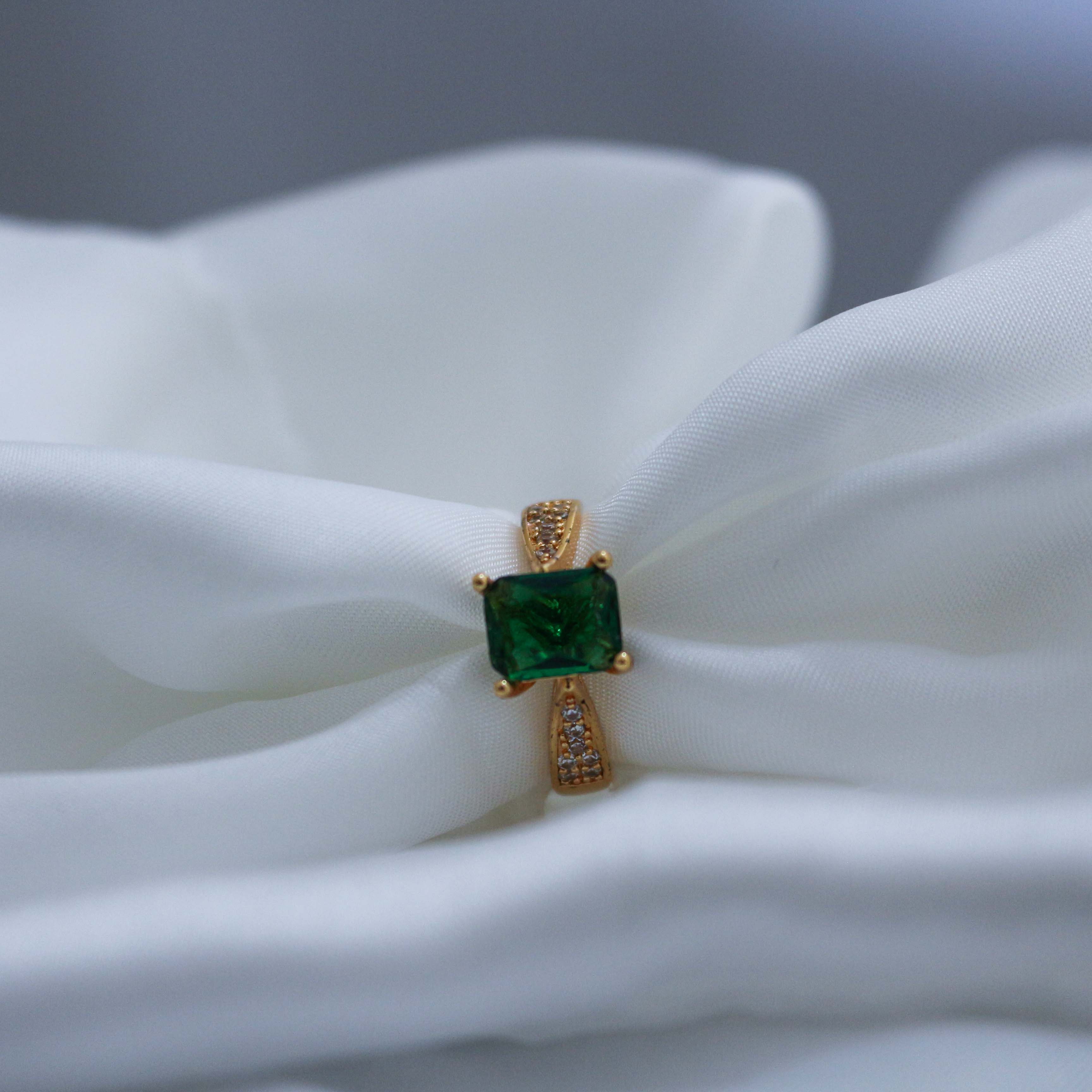 ring with a green gemstone
