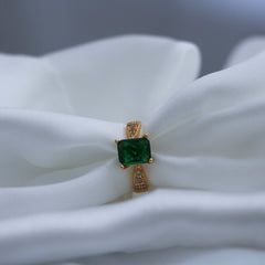 ring with a green gemstone