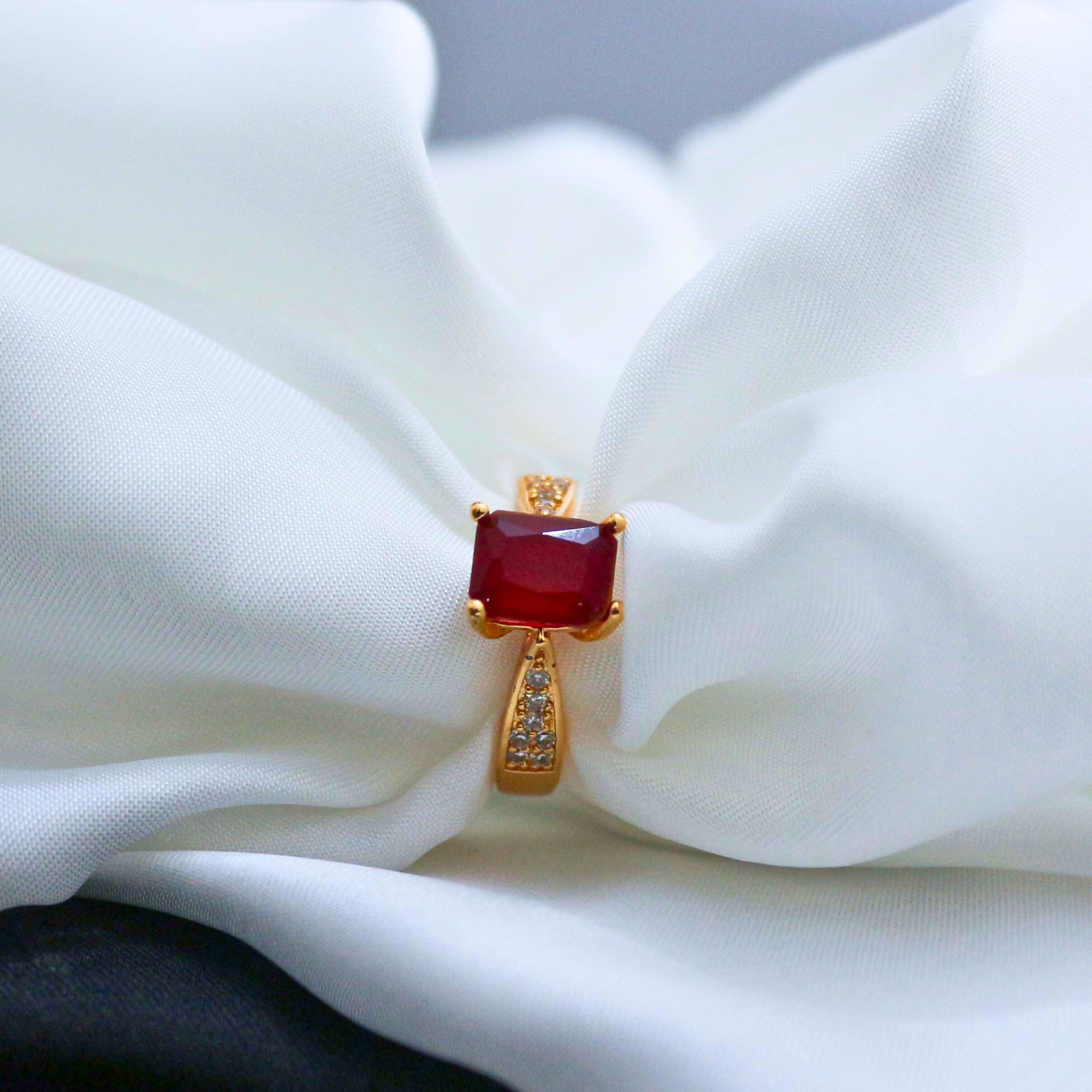 ring with a red gemstone