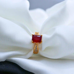 ring with a red gemstone