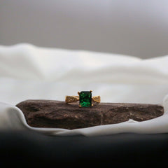  ring with a green gemstone