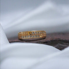 Golden ring with engraved design