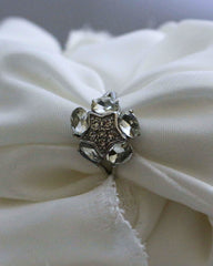 Silver decorative ring with gemstones