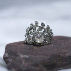 Silver ring with a large central gemstone