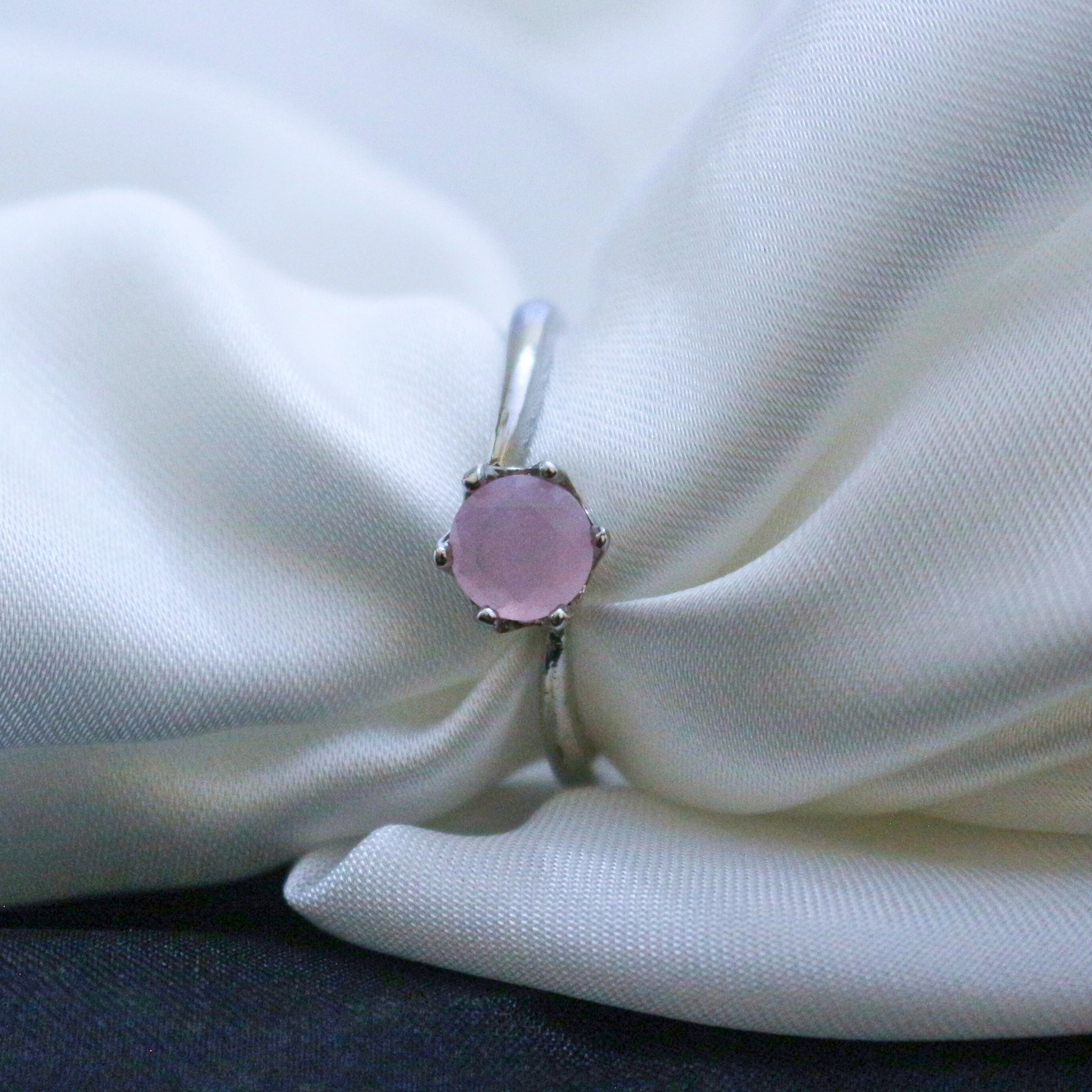 Ring with a pink gemstone