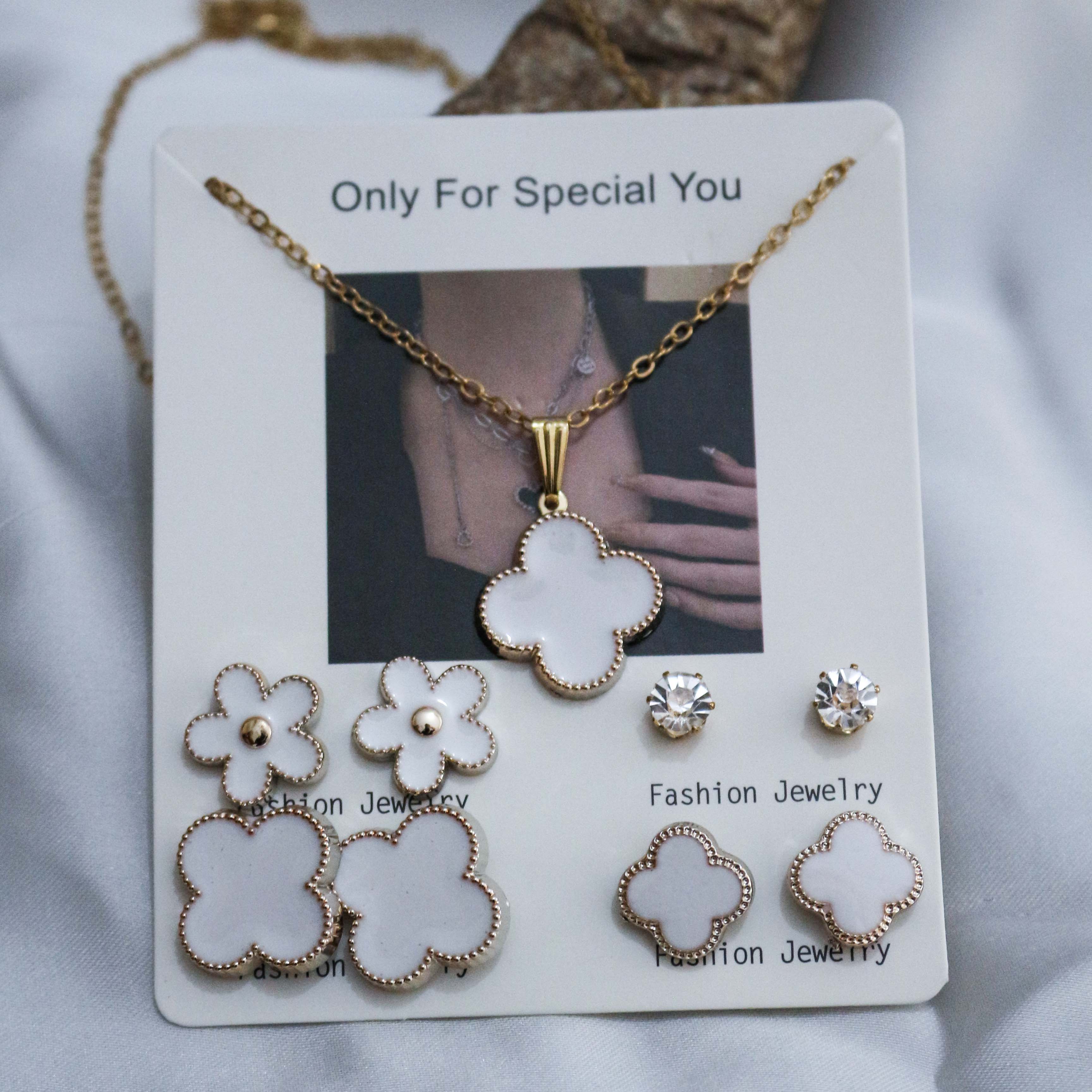 Jewelry set with necklace, earrings, and pendants